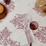 white table cloth with pink floral pattern block printed on fair trade cotton