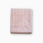 pink and white block print tablelcoth