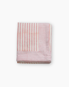 pink and white block print tablelcoth
