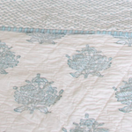 double sided quilt, white bedspread, blue bedspread, hand blocked quilt, oka, the curated store, cutter brooks, the old and new company