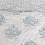 double sided quilt, white bedspread, blue bedspread, hand blocked quilt, oka, the curated store, cutter brooks, the old and new company